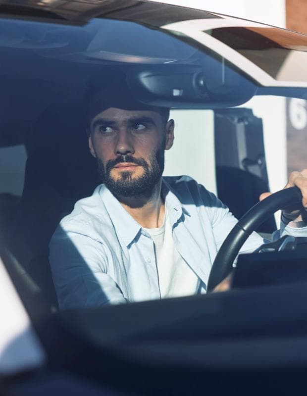 Man driving a car