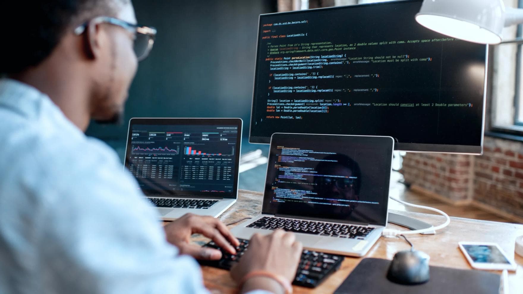 man working at computer