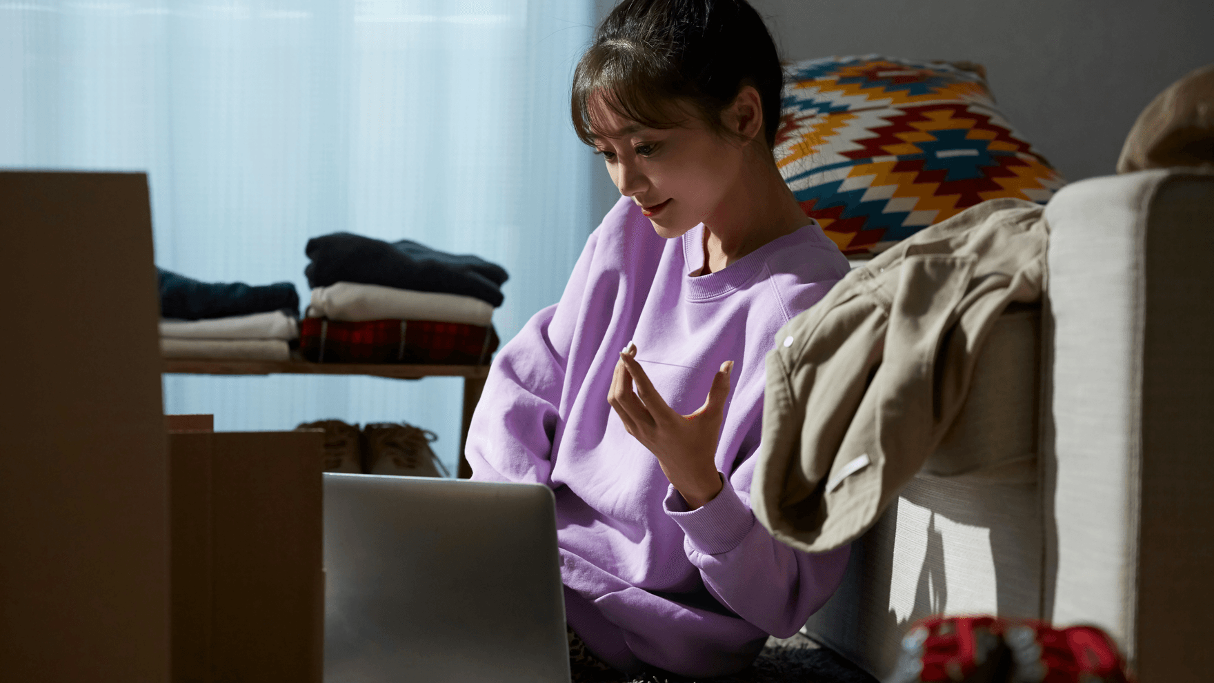 Woman looking at laptop