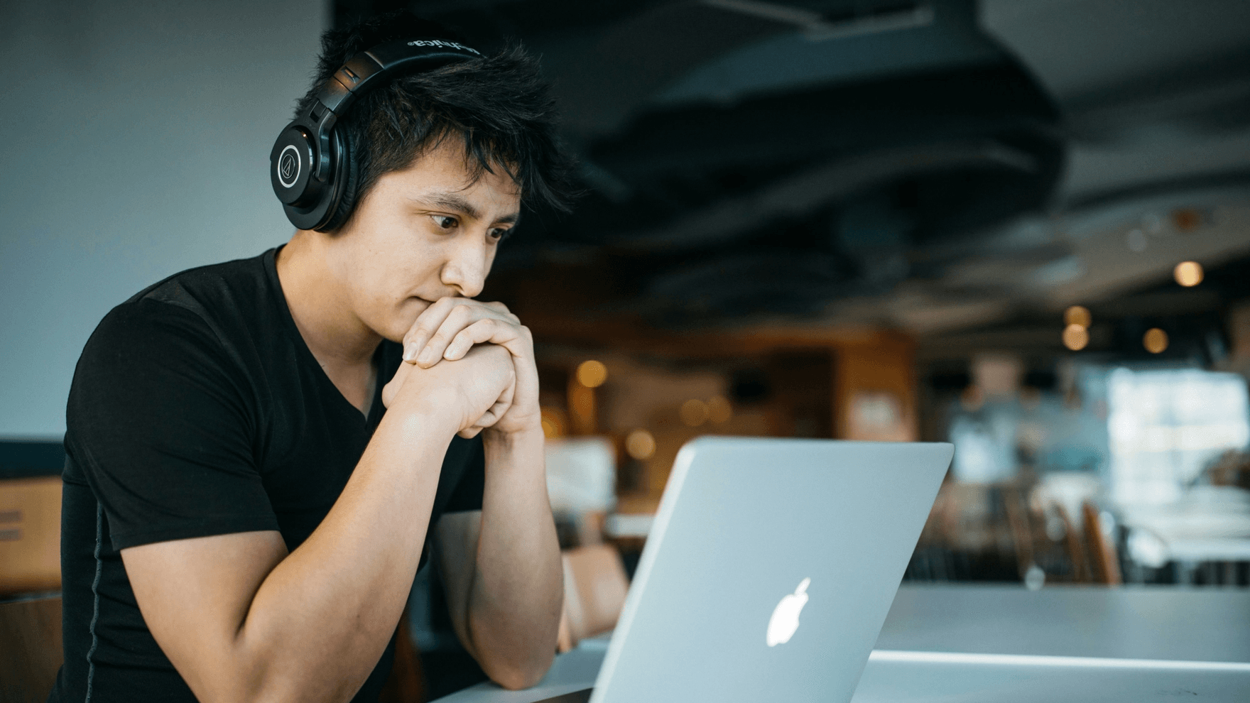 Man reading on his computer