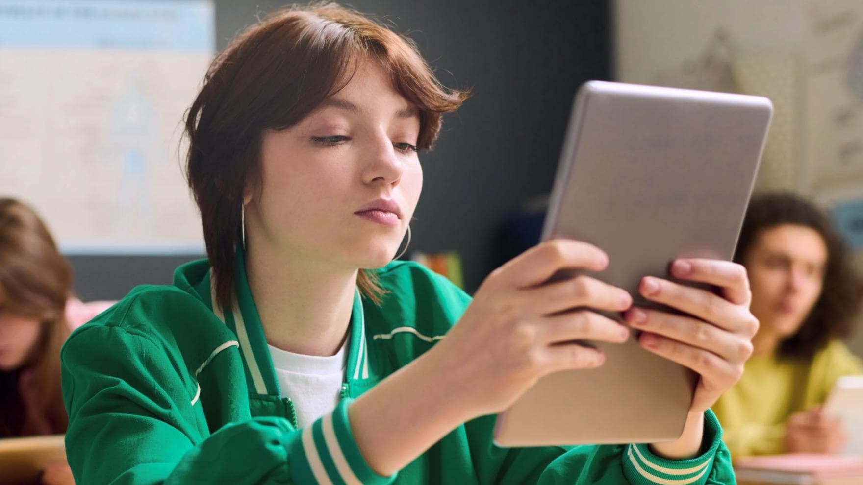 Girl looking at tablet