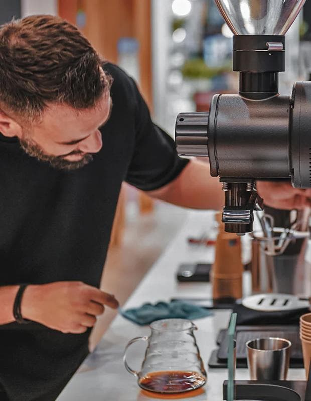 Barista making coffee