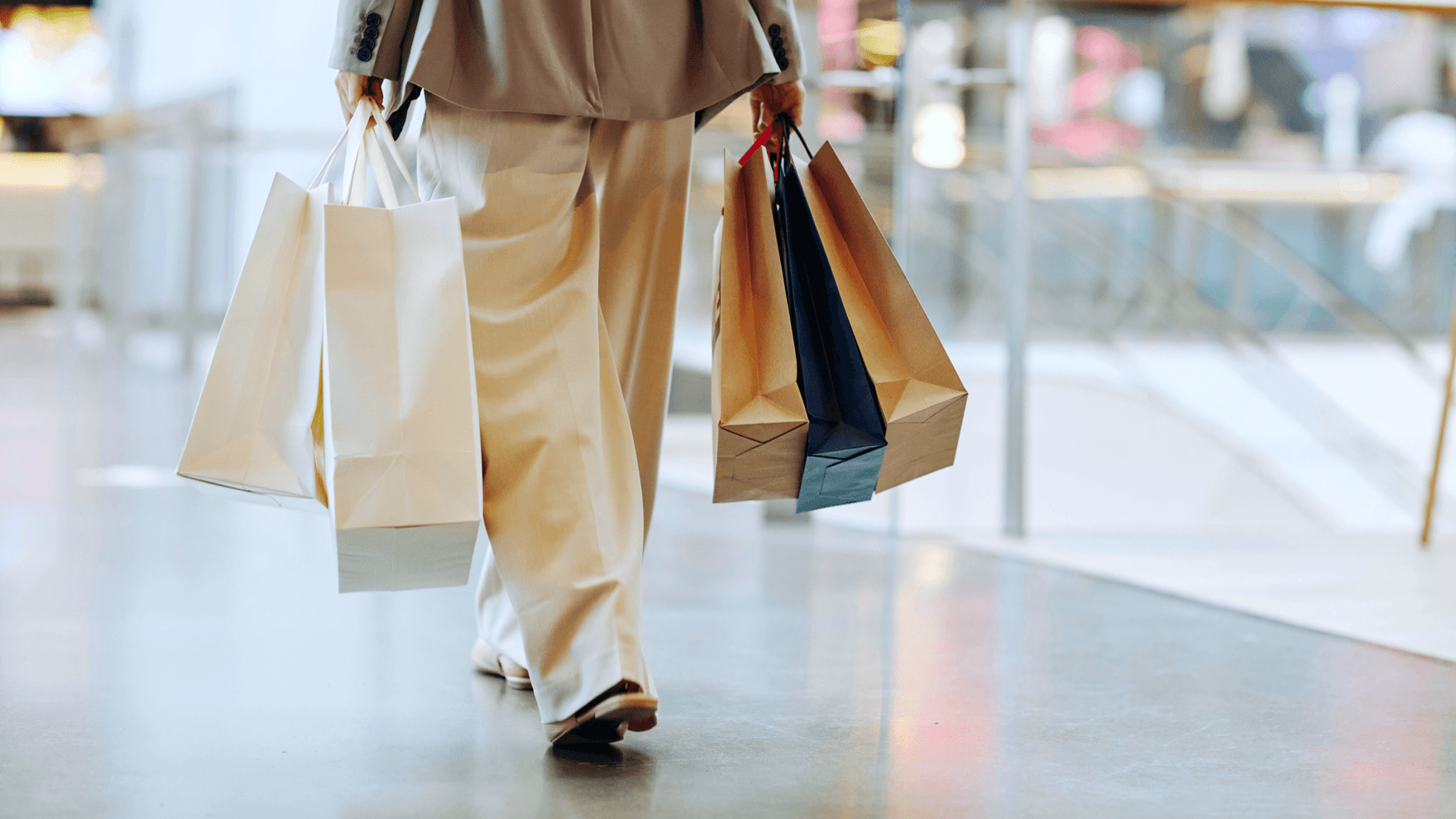 Person walking with shopping bags