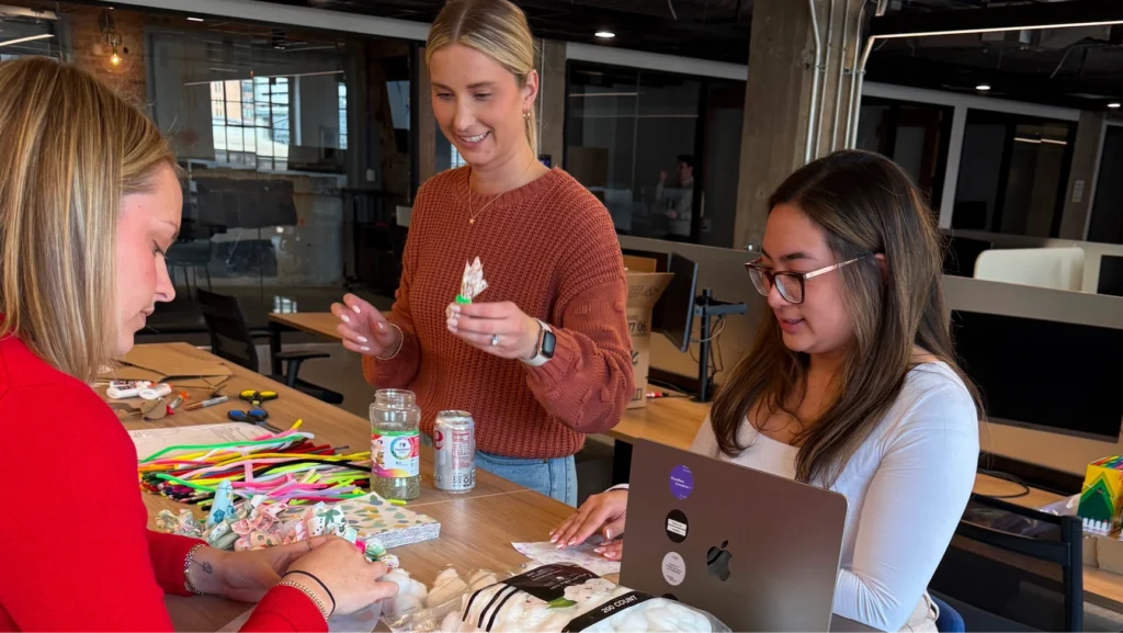 Codal employees crafting toys to bring over to the Anti-Cruelty Society for Global Volunteer Week 