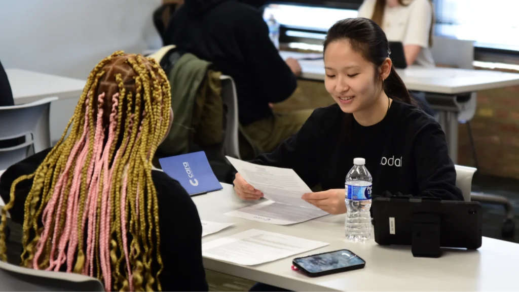 Codal team member participating in a mock interview at the Cara Collective 