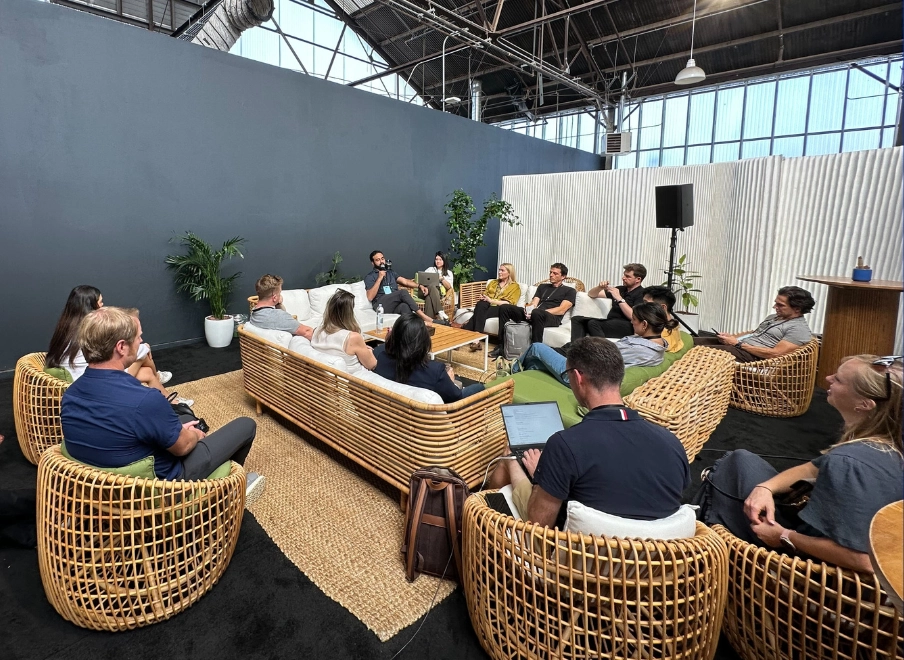 A group of people chatting at a workshop