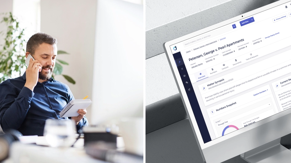 Lawyer speaking on the phone while looking at a notebook on the left and claim overview on desktop on the right