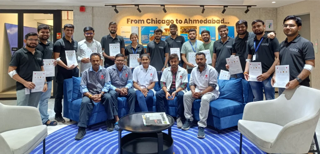 AMD employees with blood donation certificates