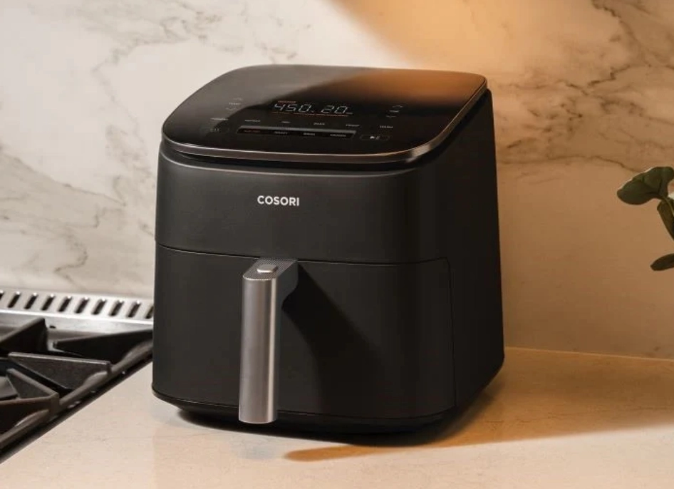 Cosori air-fryer over marble countertop