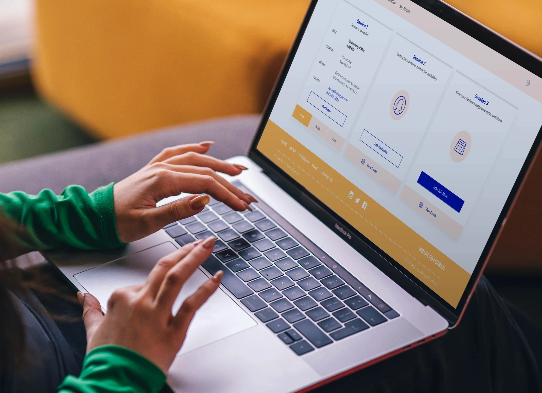 Girl browsing the BUILT BY GIRLS website on a laptop