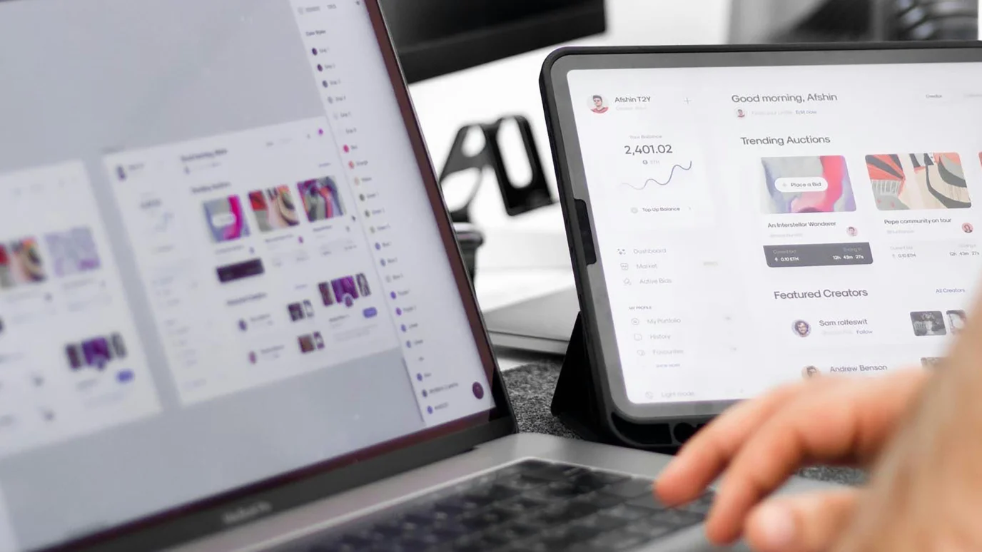 Side-by-side view of a dashboard design on a laptop and a tablet.